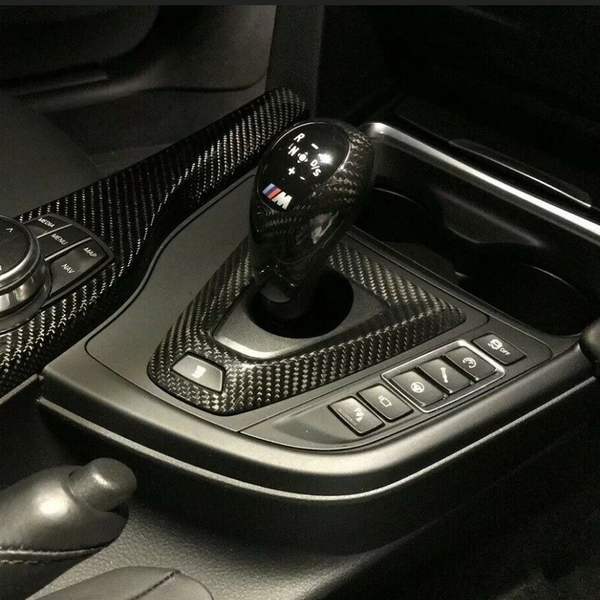 Installed BMW M Performance carbon fiber interior gear shift knob and surround trim for right-hand drive (RHD) M2 F87, M3 F80, and M4 F82/F83 models in Australia.