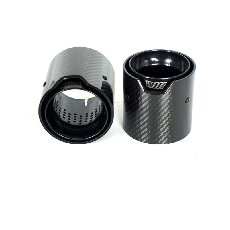 High-quality carbon fiber exhaust tips with perforated inner core and sleek black glossy finish, ideal for enhancing performance and aesthetics of sports cars and luxury vehicles